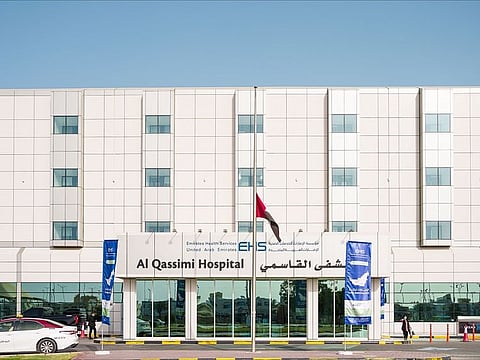 The main facade of Al Qassimi Hospital in Sharjah, UAE.