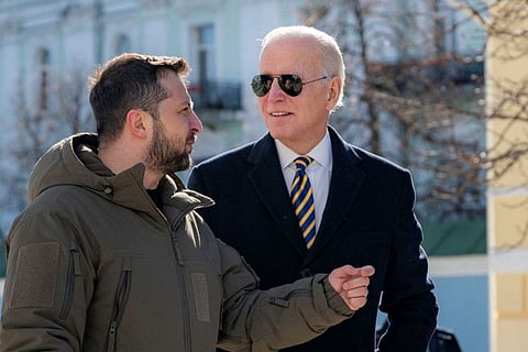 US President Joe Biden walking next to Ukrainian President Volodymyr Zelensky in front of St. Michaels Golden-Domed Cathedral while on a recent visit to Kyiv.