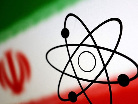Atom symbol and Iran flag are seen in this illustration.