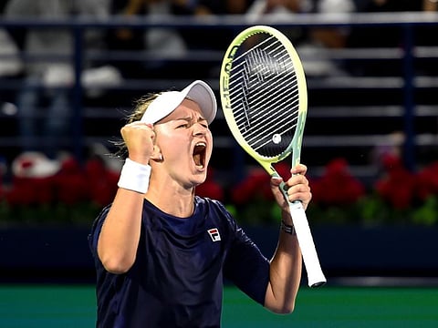 Barbora Krejcikova celebrates after winning the Dubai Tennis Championship women's singles title.