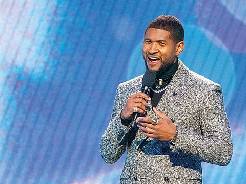 R&B singer and songwriter Usher during halftime at the 2022 NBA All-Star Game at Rocket Mortgage Field House.