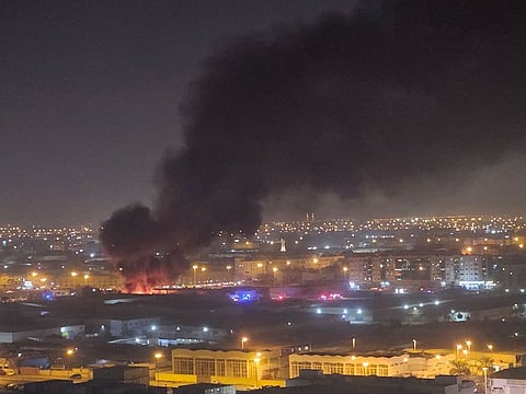 Workers in nearby premises were evacuated as thick black smoke was seen billowing from several kilometres away.