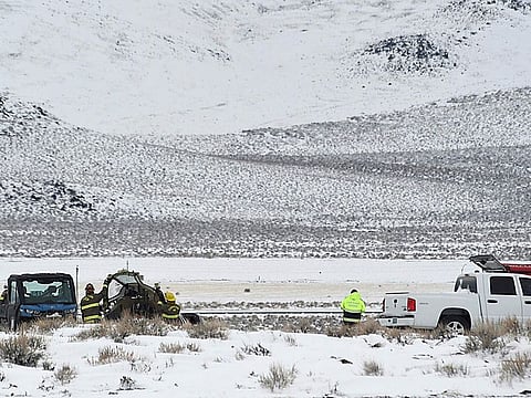 A Care Flight medical transport plane carrying a patient and four others that crashed the day before is seen Saturday in Lyon County, Nev.ada