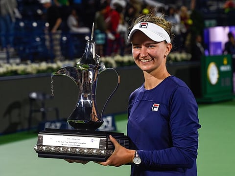Barbora Krejcikova of Czech Republic celebrate with the trophy after her win over Iga Swiatek of Poland in the final of the WTA Dubai Duty Free Tennis Championships on February 23, 2023. It was Krejcikova’s sixth WTA singles title.