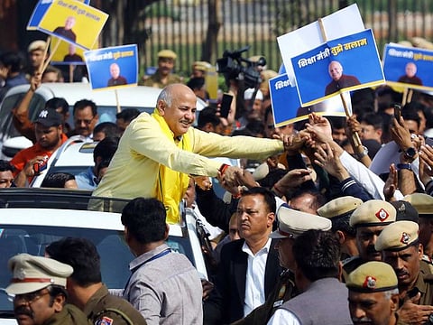 Delhi Deputy Chief Minister Manish Sisodia being greeted by supporters at Rajghat prior to leaving for the Central Bureau of Investigation (CBI) office for questioning in connection with the liquor policy case, in New Delhi on Sunday, February 26, 2023.