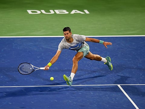 World No. 1 Novak Djokovic of Serbia practises at the Centre Court of the Dubai Tennis Stadium on Sunday, for the ATP Dubai Duty Free Tennis Championships. Djokovic won his 22nd Grand Slam title in Australia last month to equal Spaniard Rafael Nadal’s record.