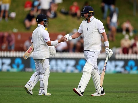 England's Ben Duckett (left) and teammate Ollie Robinson walk from the field at the end of day four of the second Test against New Zealand at the Basin Reserve in Wellington.