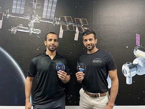 Emirati astronauts Sultan Al Neyadi (right) and Hazza Al Mansouri