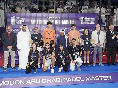 Sheikh Saeed Bin Maktoum Bin Juma Al Maktoum, President of the UAE Padel Association (centre) with the winners of the 2023 World Padel Tour season opener, Abu Dhabi.