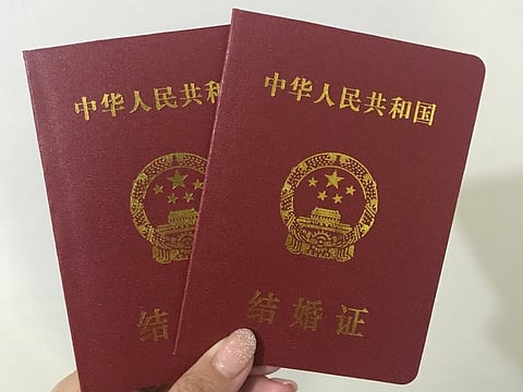 You can book an appointment online and go to the Chinese embassy or its consulate in the UAE to register your marriage certificate. Picture used for illustrative purposes.