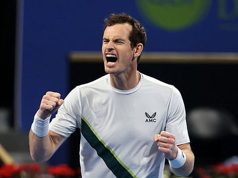 Britain’s Andy Murray celebrates after winning his semifinal against Czech Republic’s Jiri Lehecka at the Qatar Open in Doha on February 24, 2023. He lost the final to Daniil Medvedev, and withdrew from the Dubai Duty Free Tennis Championship after a recurrence of hip injury.