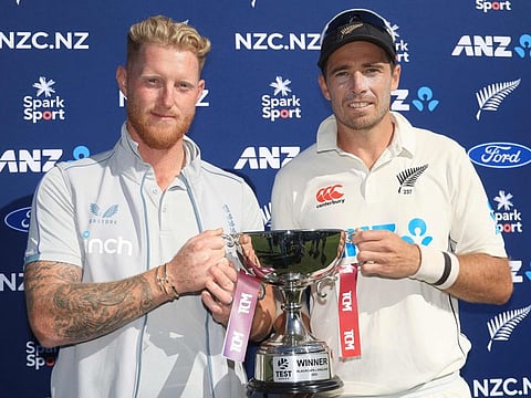 New Zealand's captain Tim Southee (right) with England's captain Ben Stokes jointly hold the Test Series trophy on day five of the second cricket Test at the Basin Reserve in Wellington.