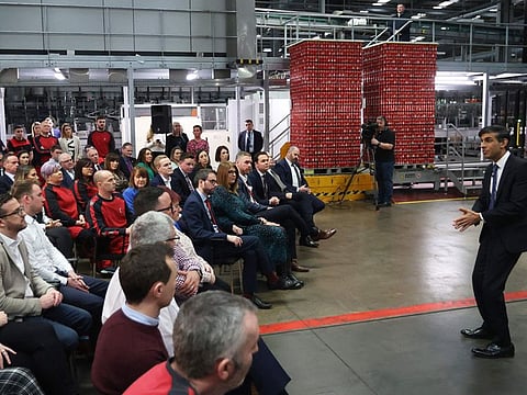 Britain's Prime Minister Rishi Sunak holds a Q&A session with local business leaders during a visit to Coca-Cola HBC in Lisburn, Co Antrim in Northern Ireland on February 28, 2023.