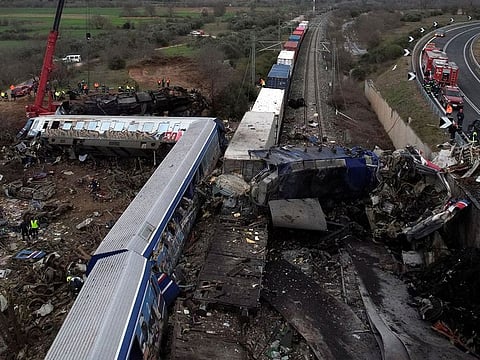 Rescue crews operate at the site of a crash, where two trains collided, near the city of Larissa, Greece.