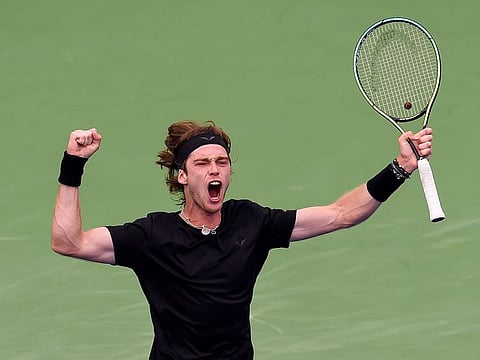 Defending champion Andrey Rublev celebrates after defeating Alejandro Davidovich Fokina in the Round of 16 in the ATP Dubai Duty Free Tennis Championship on March 1, 2023. Davidovich Fokina blew five match points in the tiebreaker to gift the match to Rublev.