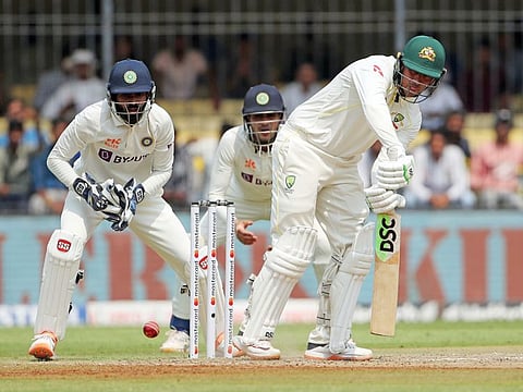 Australia's Usman Khawaja plays a shot on the first day of the 3rd Test against India, at Holkar Cricket Stadium, in Indore.