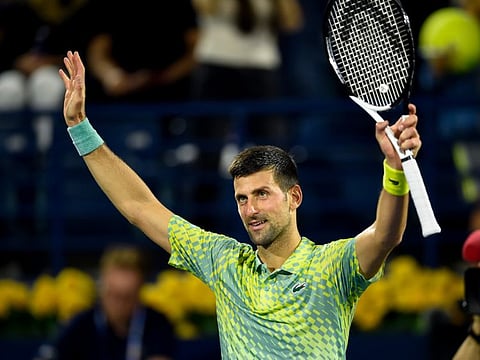 Novak Djokovic of Serbia celebrates after defeating Tallon Griekspoor of Netherlands in the ATP Dubai Duty Free Tennis Championships.