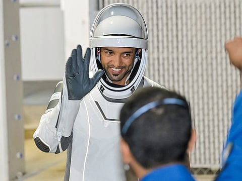 NASA's SpaceX Crew-6 mission astronaut Sultan Al-Neyadi, from the United Arab Emirates, waves as the crew departs for the launch pad before launch to the International Space Station from the Kennedy Space Center in Cape Canaveral, Florida, U.S., March 1, 2023. REUTERS/Steve Nesius