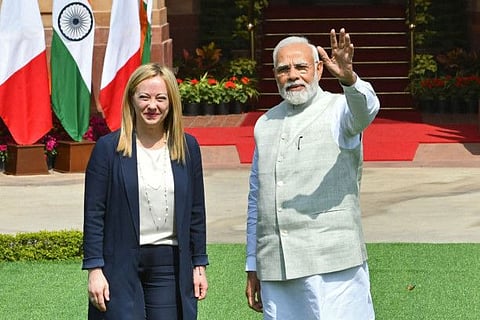 India's Prime Minister Narendra Modi (R) and his Italian counterpart Giorgia Meloni pose before their meeting at the Hyderabad House in New Delhi on March 2, 2023.