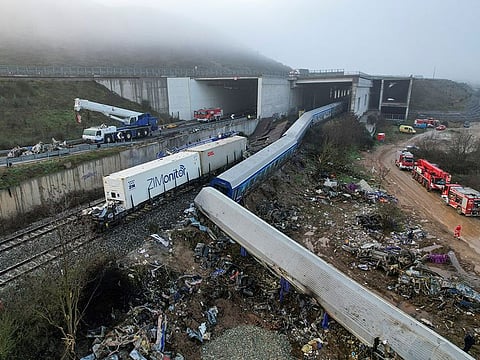 Rescuers operate on the site of a crash, where two trains collided, near the city of Larissa, Greece.