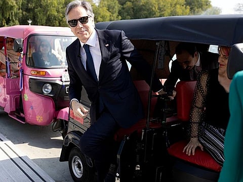 Antony Blinken takes a ride in an auto-rickshaw during a meeting with the staff from US Embassy India, US Consulate General Hyderabad, US Consulate Kolkata, US Consulate General Chennai and US Consulate Mumbai, in New Delhi on Friday.