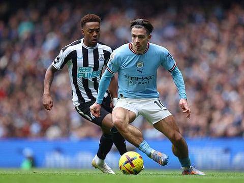 Newcastle United's Joe Willock (left) in action with Manchester City's Jack Grealish during the Premier League clash at the Etihad Stadium, Manchester.