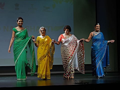 'Cancer warriors' won applaud during their catwalk on stage at the event