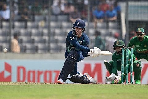 England's Jason Roy plays a shot as Mushfiqur Rahim (centre) and Bangladesh's Litton Das in action during the second international one day match at the Sher-e-Bangla National Cricket Stadium in Dhaka.