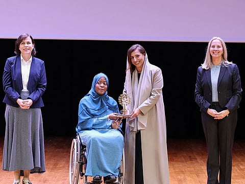 Sheikha Bodour bint Sultan Al Qasimi (second from right), President of American University of Sharjah, with an honouree