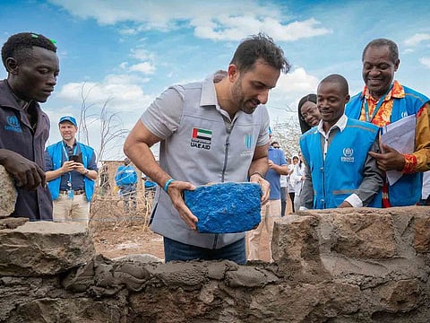 Sheikh Sultan bin Ahmed bin Sultan Al Qasimi, Deputy Ruler of Sharjah and the Humanitarian Envoy of The Big Heart Foundation, places the final stone in the last shelter to signal the completion of the first phase of the ‘Home for a Home’ project