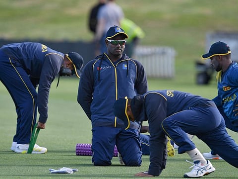 Sri Lanka's Angelo Mathews (centre) and teammates warm-up during a practice session ahead of the first Test match against New Zealand at Hagley Oval in Christchurch.