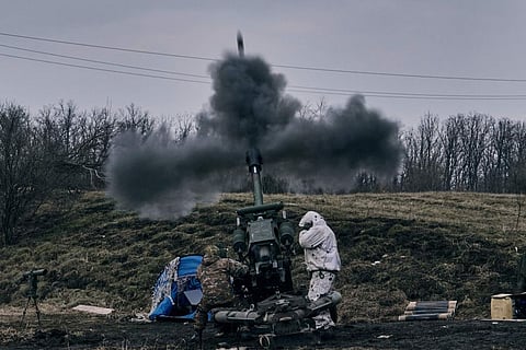 Ukrainian soldiers fire a self-propelled howitzer towards Russian positions near Bakhmut, the site of the heaviest battles, Donetsk region, Ukraine, Tuesday, March 7, 2023.