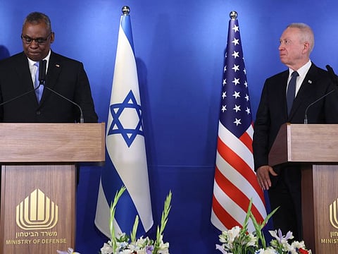 Israeli Minister of Defence Yoav Gallant (right) and US Secretary of Defence Lloyd Austin deliver a statements to the press at the Israel Aerospace Industries (IAI) headquarters near the Ben Gurion airport in Tel Aviv, on March 9, 2023.