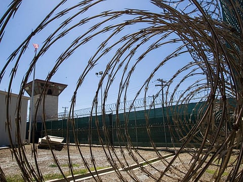 With Sharbi’s release, 31 detainees remain at Guantanamo, down from a peak of nearly 800.