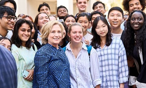 Former U.S. Secretary of State Hillary Rodham Clinton with NYUAD students while visiting the university, March 7, 2023