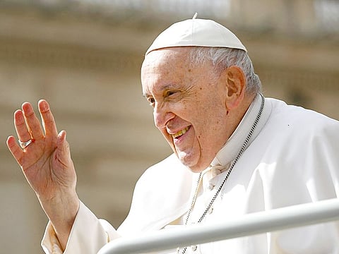Pope Francis waves as he leaves at the end of the weekly general audience on March 8, 2023 at St. Peter's square in The Vatican.