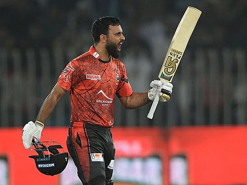 Lahore Qalandars' Fakhar Zaman celebrates after scoring a century against Islamabad United in the Pakistan Super League on Thursday.