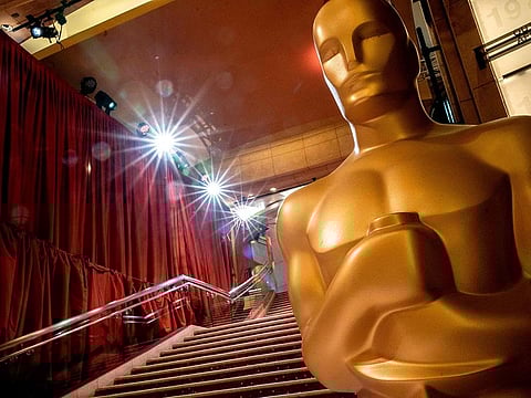 Oscars statues line the red carpet as preparations are made ahead of the 95th Academy Awards, in Hollywood, California, on March 10, 2023.