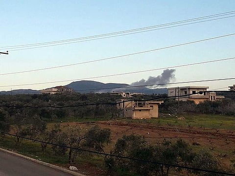 A handout image released on March 12, 2023 by the official Syrian Arab News Agency (SANA) shows smoke billowing from a site targeted by Israeli airstrikes in Masyaf in the central Hama countryside.