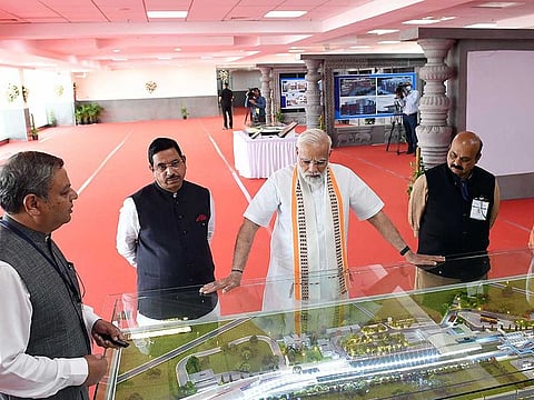 Prime Minister Narendra Modi during his visit to lay foundation stone and dedicate to nation key development projects at Hubballi-Dharwad, on Sunday, March 12, 2023.
