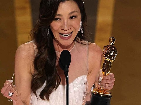 Michelle Yeoh accepts the Oscar for Best Actress for "Everything Everywhere All at Once" during the Oscars show at the 95th Academy Awards in Hollywood, Los Angeles, California, US, March 12, 2023.