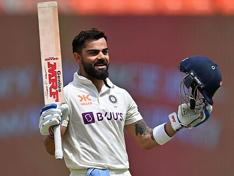 India's Virat Kohli celebrates after scoring a century during the fourth day of the fourth and final cricket Test against Australia at the Narendra Modi Stadium in Ahmedabad on March 12, 2023. Kohli was out after scoring 186 and by then India were in a safe position. The Test in a draw, and India won the series 2-1.