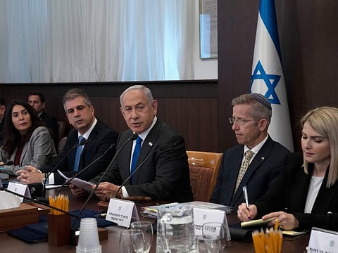 Israel's Prime Minister Benjamin Netanyahu (third right) makes opening remarks at the weekly cabinet meeting in Jerusalem.