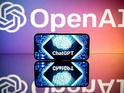 Screens displaying the logos of OpenAI and ChatGPT. The company behind the ChatGPT app that churns out essays, poems or computing code on command released Tuesday a long-awaited update of its artificial intelligence (AI) technology that it said would be safer and more accurate than its predecessor.
