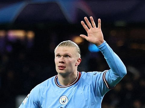 Manchester City's Erling Haaland celebrates scoring his fifth goal against RB Leipzig in the Champions League clash at the Etihad Stadium last night.