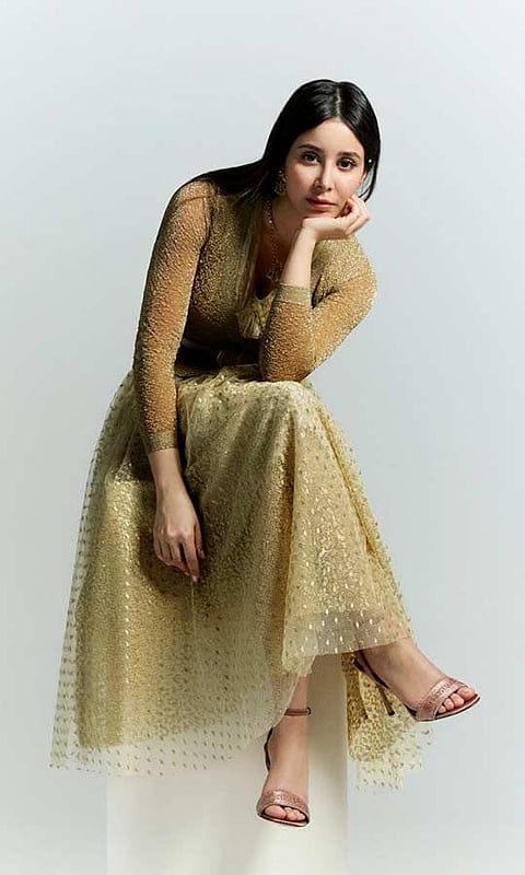 Saudi actress Aseel Omran in a long tulle and lace dress