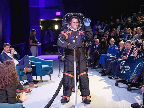 Chief Engineer Jim Stein wears the new spacesuit during the Axiom Space Artemis III Lunar Spacesuit event at Space Center Houston in Houston, Texas, on March 15, 2023.