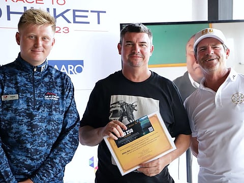 Division 1 winner - Tyrone Evans (centre)