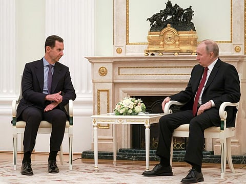 Russian President Vladimir Putin, right, listens to Syrian President Bashar Al Assad during their meeting at the Kremlin in Moscow on March 15, 2023.