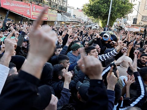 Mourners carry the body of a Palestinian who was killed during a raid by undercover Israeli forces in Jenin.